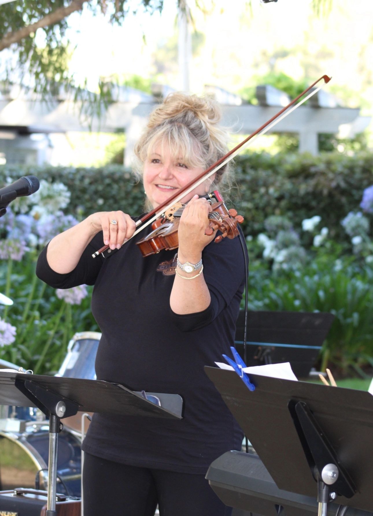 Violin teacher with student during a private music lesson